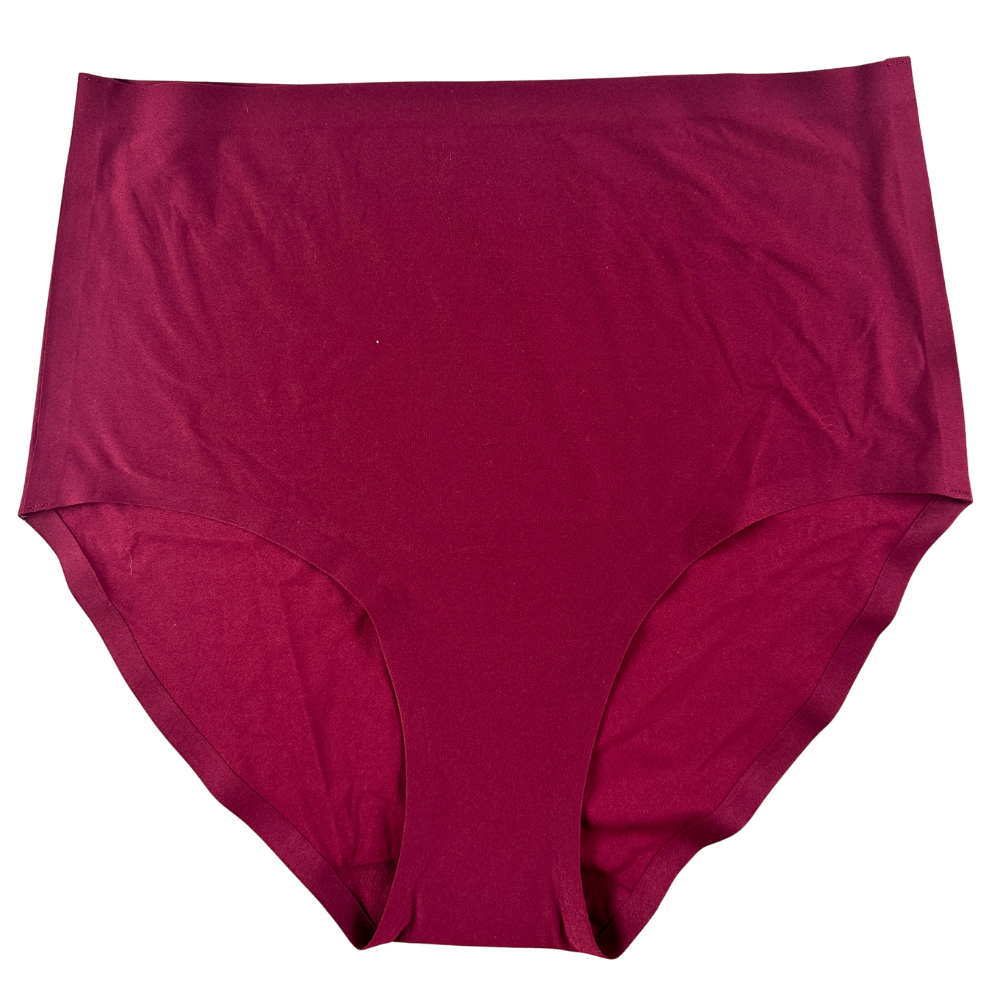 A pair of high-waisted, seamless briefs in a deep burgundy or maroon color, laid flat against a solid white background.