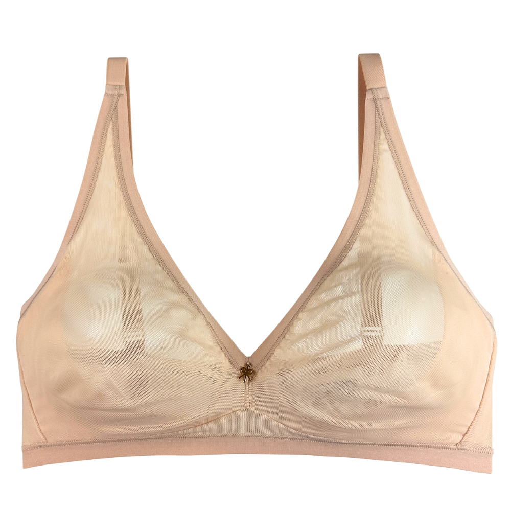 Beige bra on a white background
