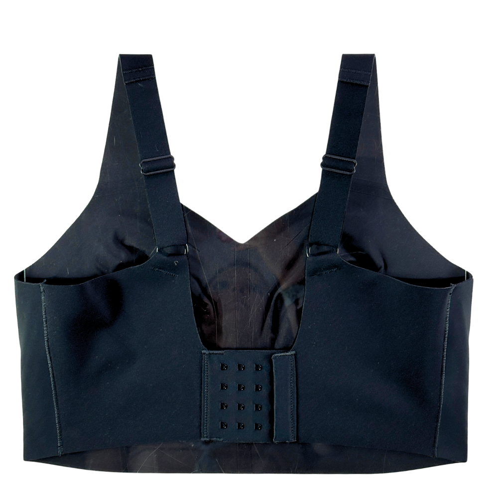 A black supportive nursing bra with wide shoulder straps, side pockets, and a central hook-and-loop closure panel, shown against a plain white background.