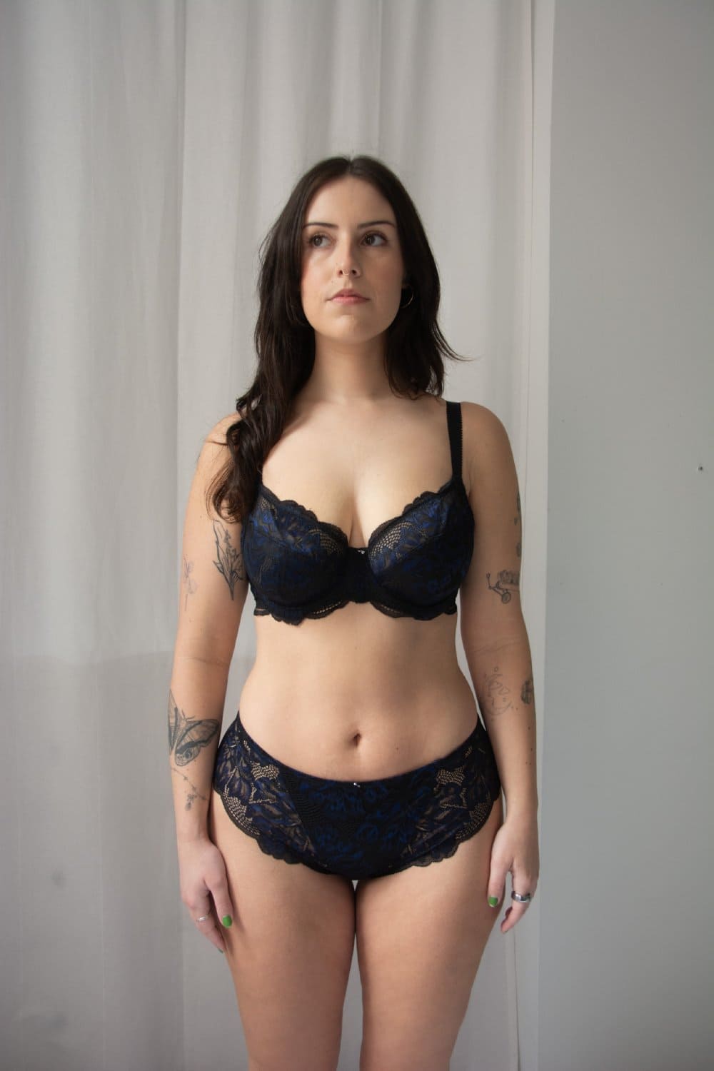 Fantasie emmaline side support bra in midnight on a model front view.