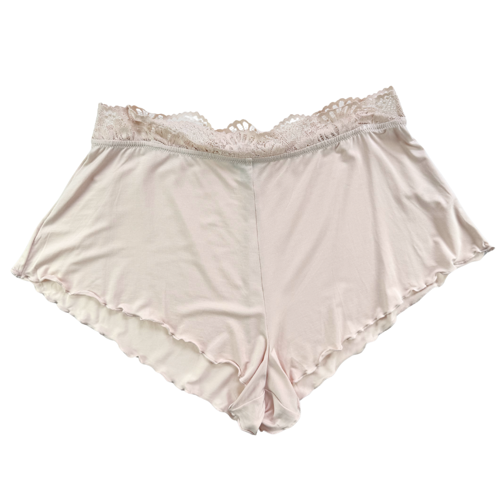 Beige satin shorts with lace waistband on a white background