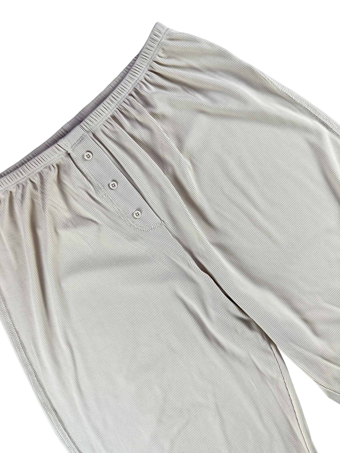 Light gray men's underwear with buttons on a white background
