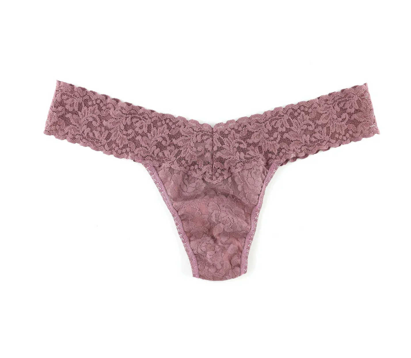 Lace thong in mauve color on a white background