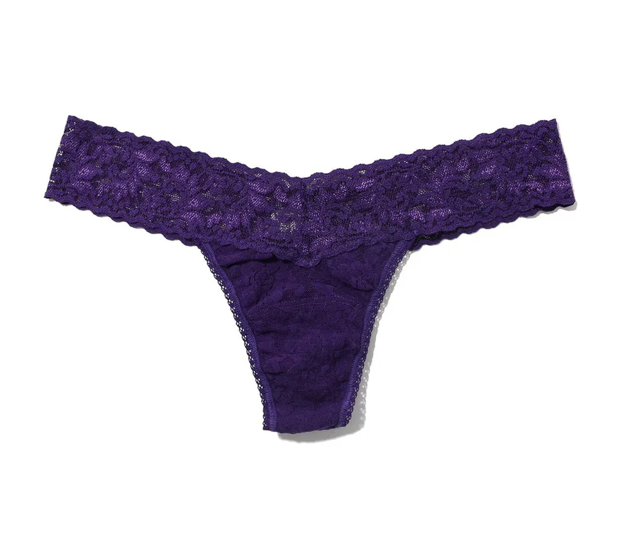 Purple lace thong on a white background