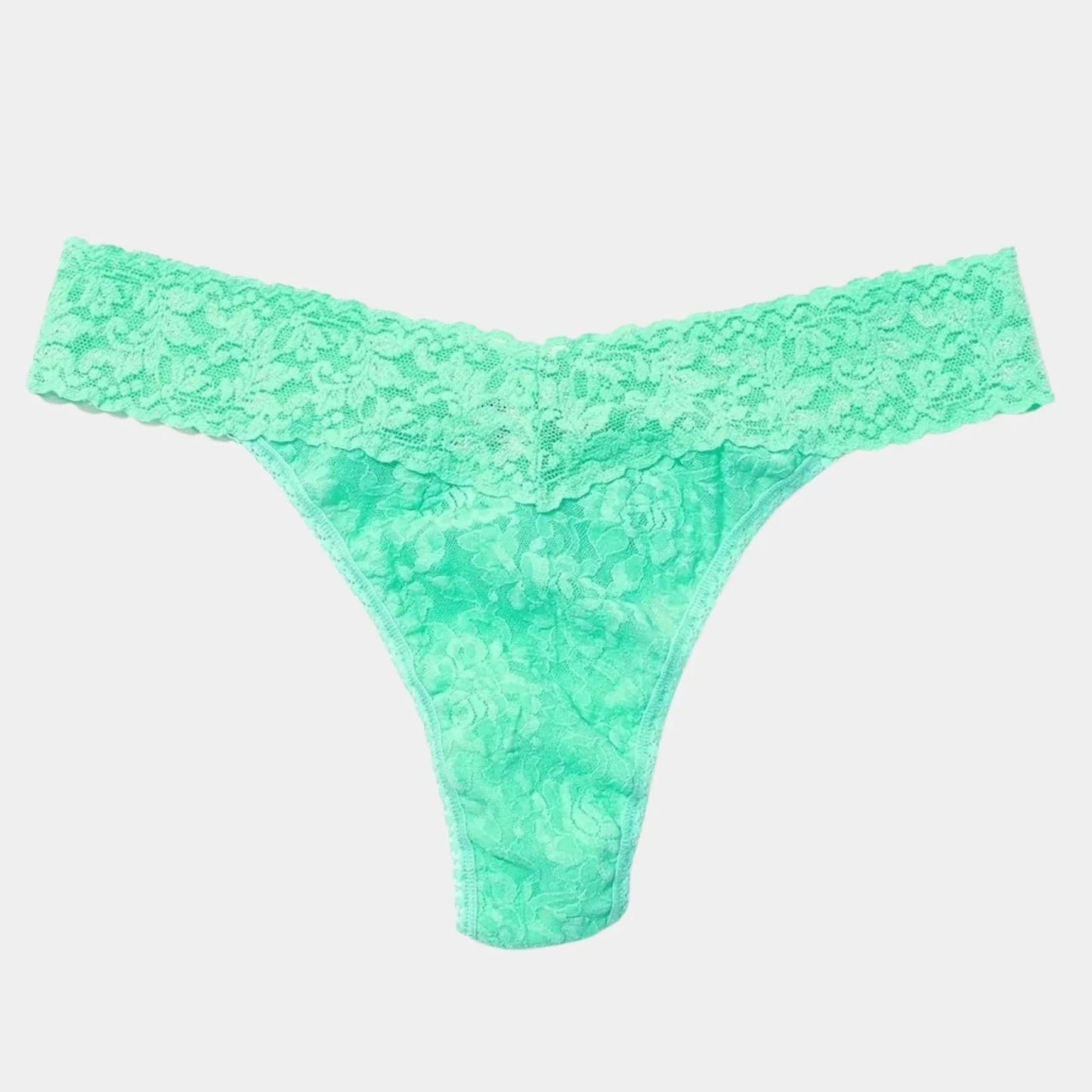 Green thong on a white background