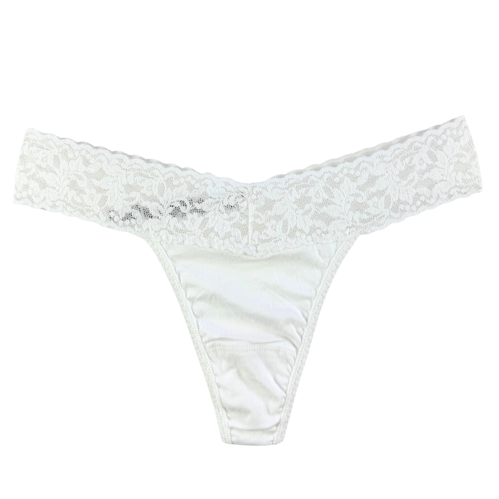 White lace thong on a white background