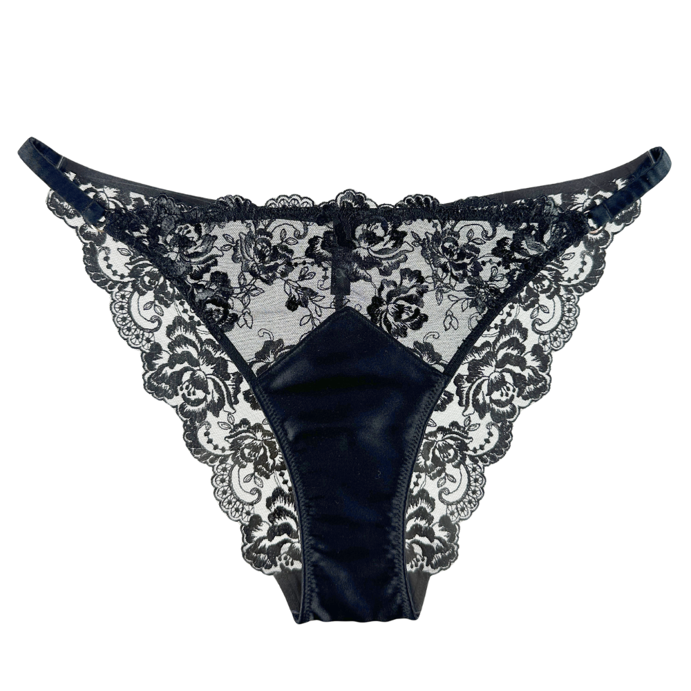 Black lace lingerie set on a white background
