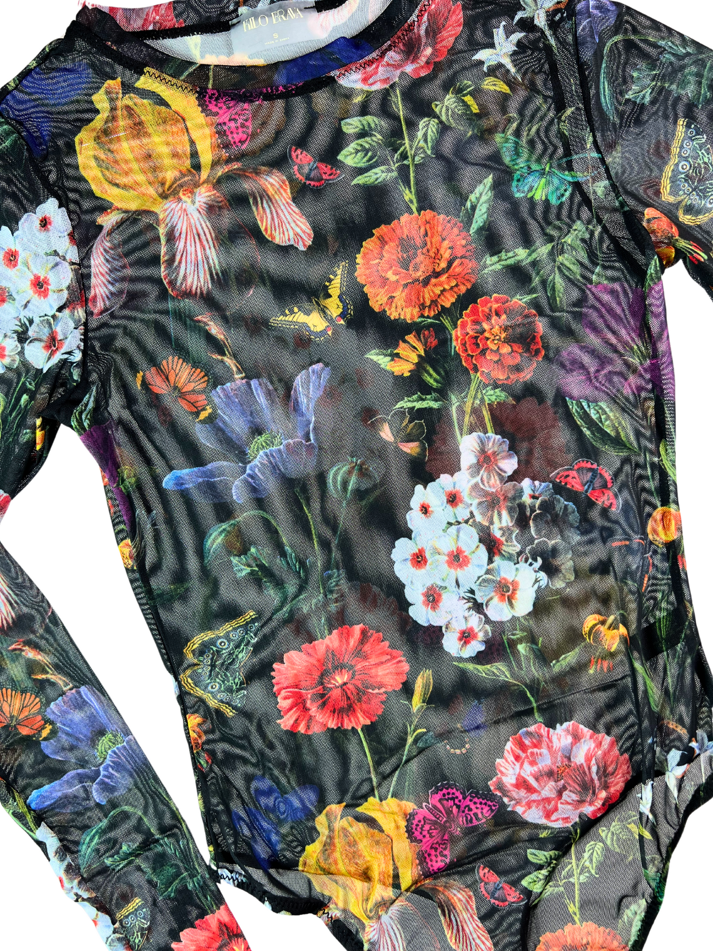 close up details of a black mesh bodysuit with florals and insects all over.