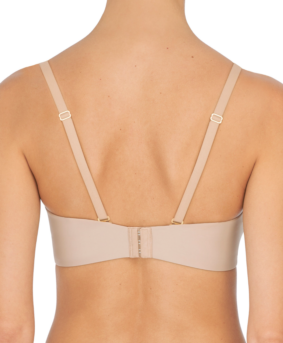 Beige bra on a mannequin with a white background