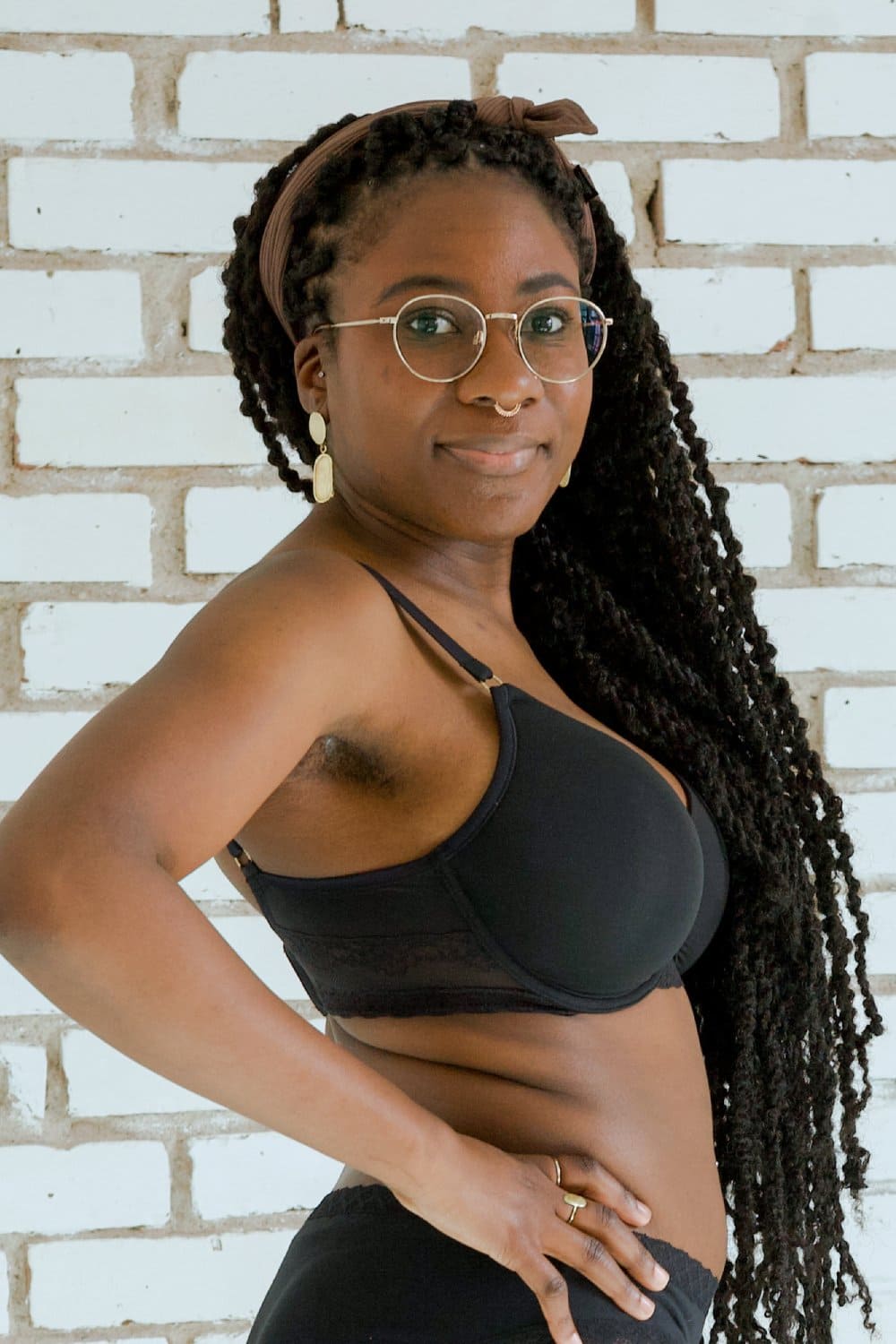 Natori Bliss Perfection contour bra in black, close-up side view on a model.