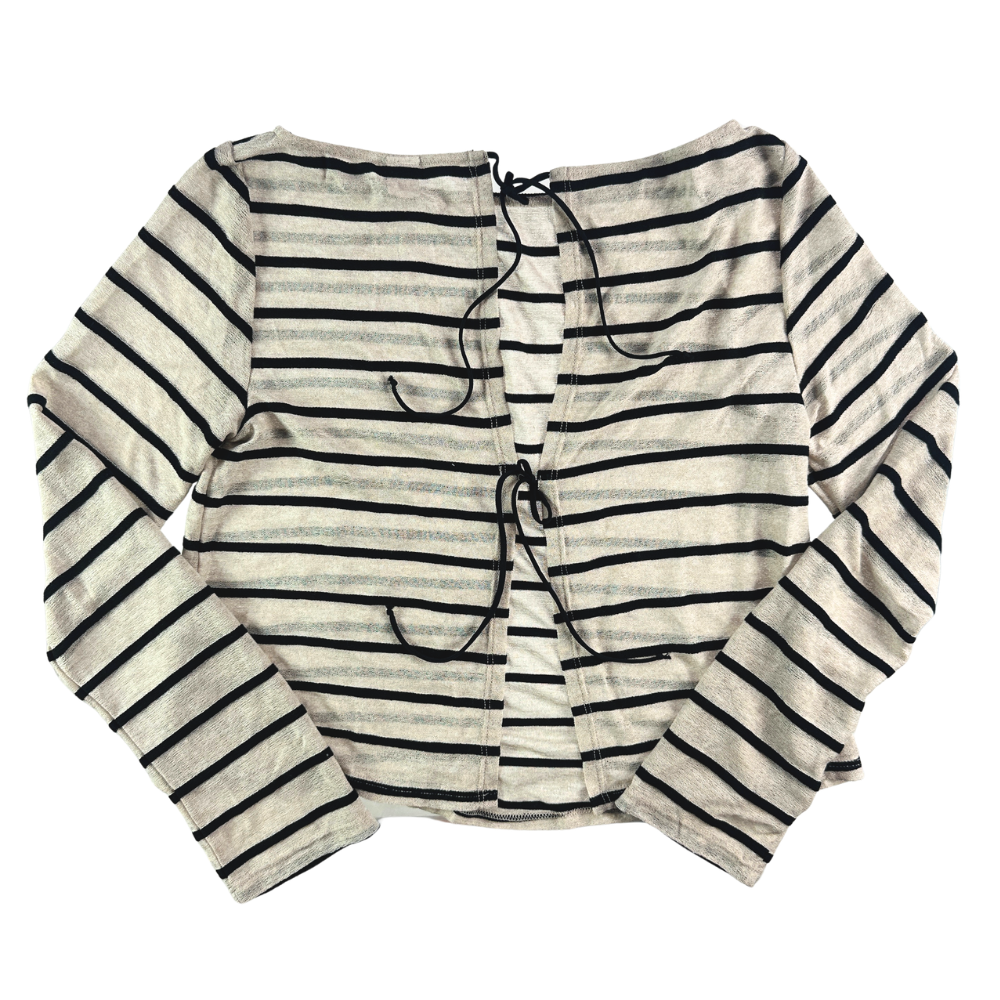 A long-sleeve knit top with horizontal black stripes on a cream-colored background, featuring a split neckline with drawstrings.