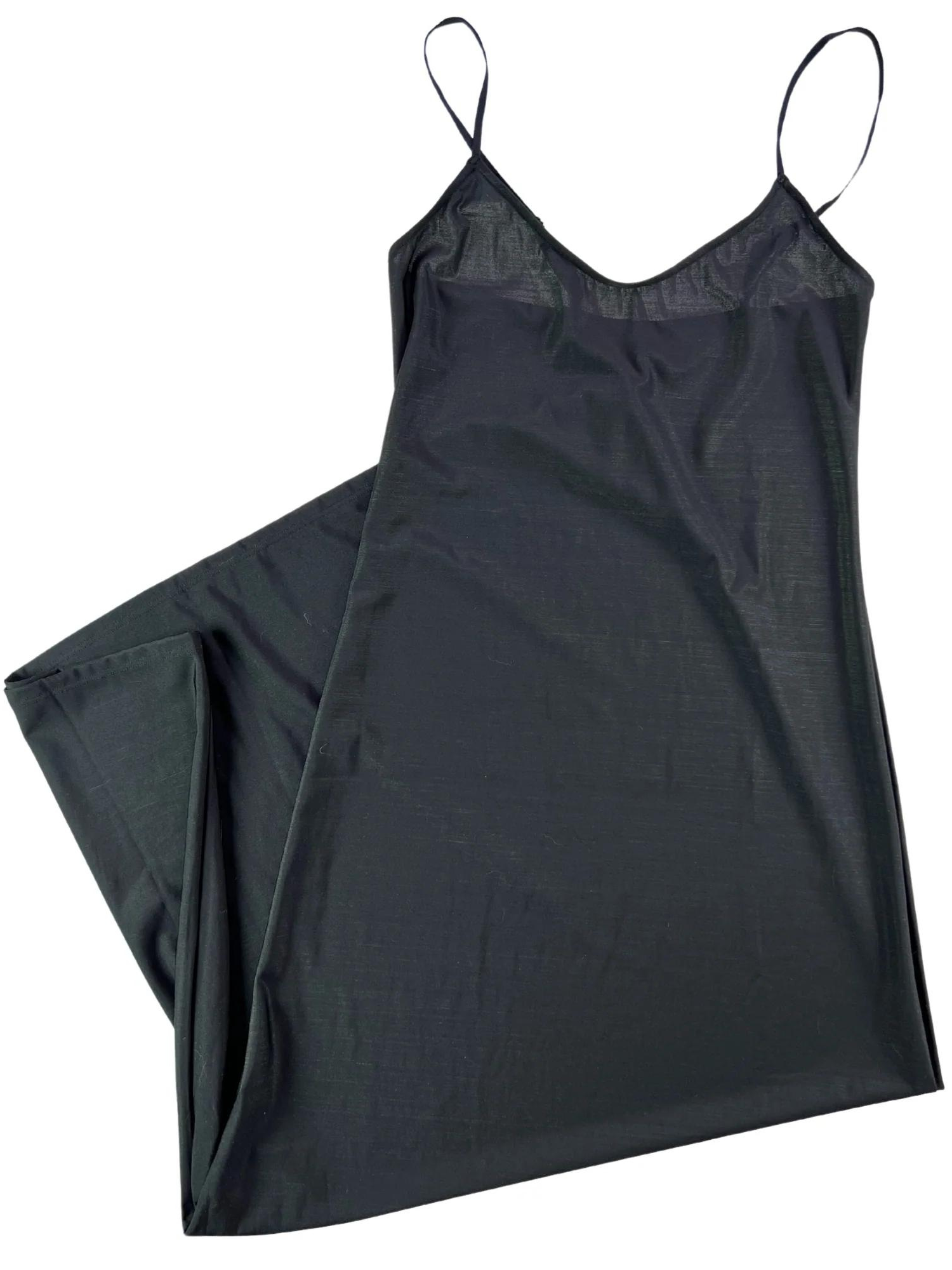 A black, gown-length slip with adjustable straps and a straight cut that hits at the ankle.