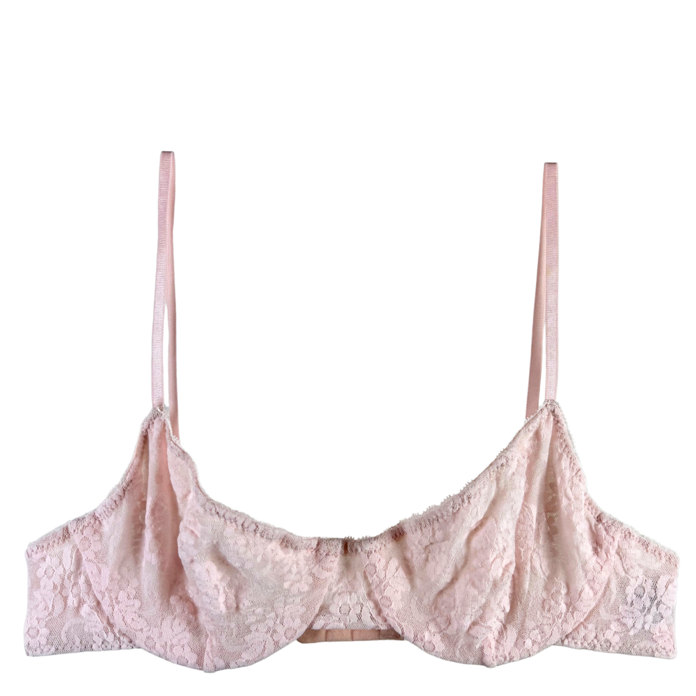 A light pink lace underwire bra with thin adjustable shoulder straps, displayed against a solid white background.