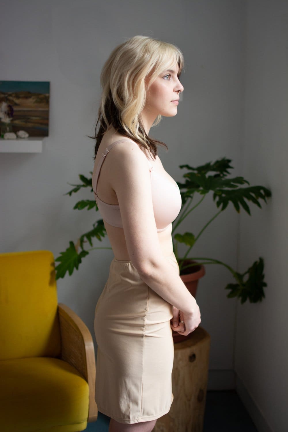 Only hearts second skin half slip in buff, side view on a model.