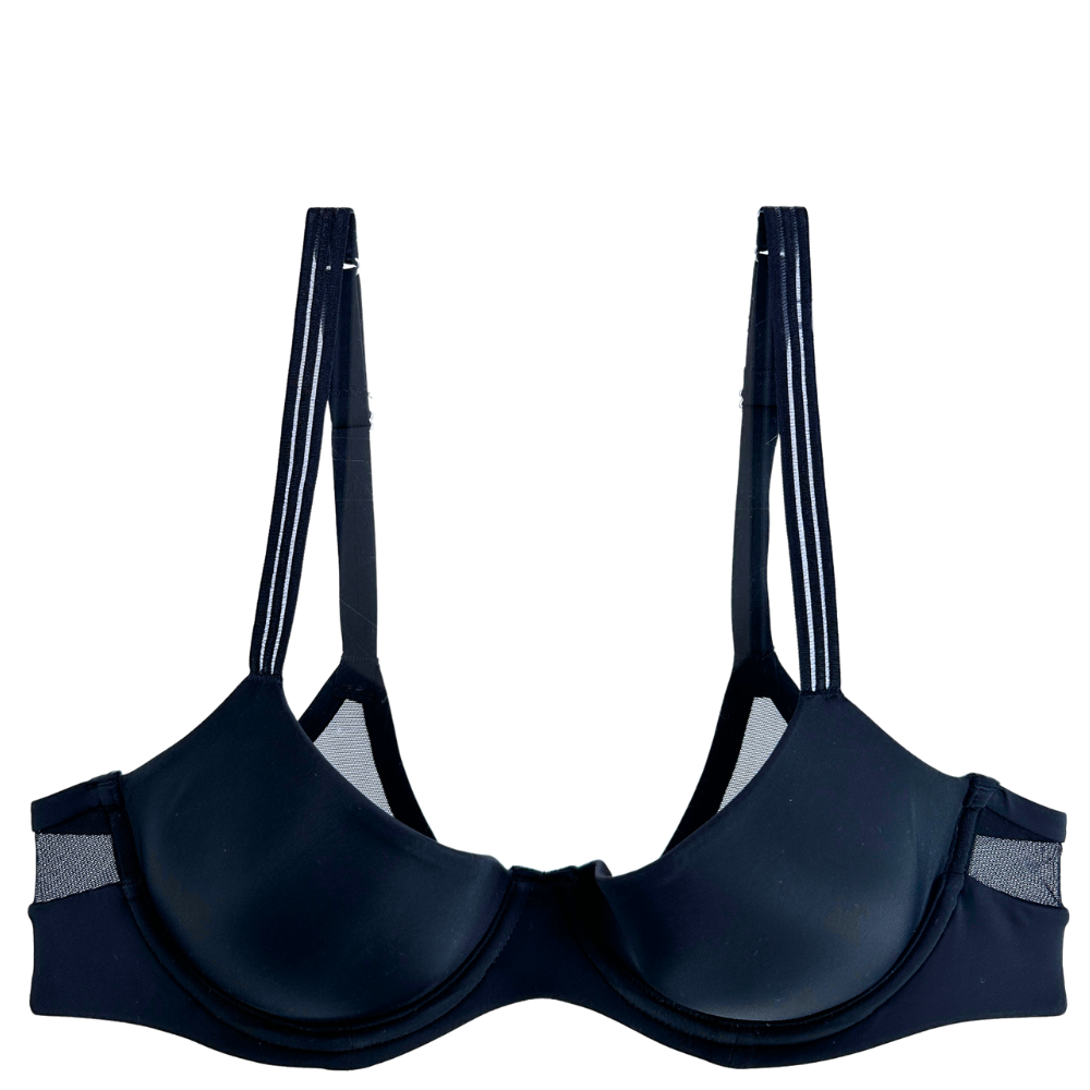 black underwire bra with mesh against a white background.