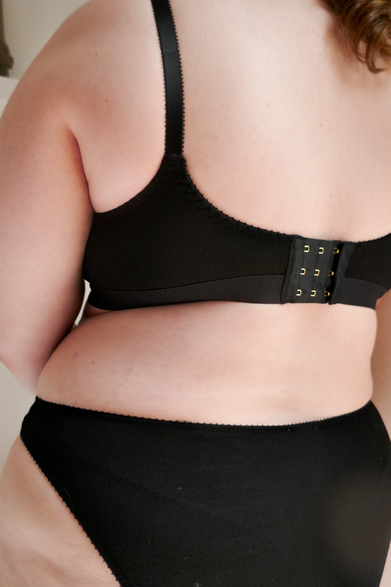 woman wearing black bra