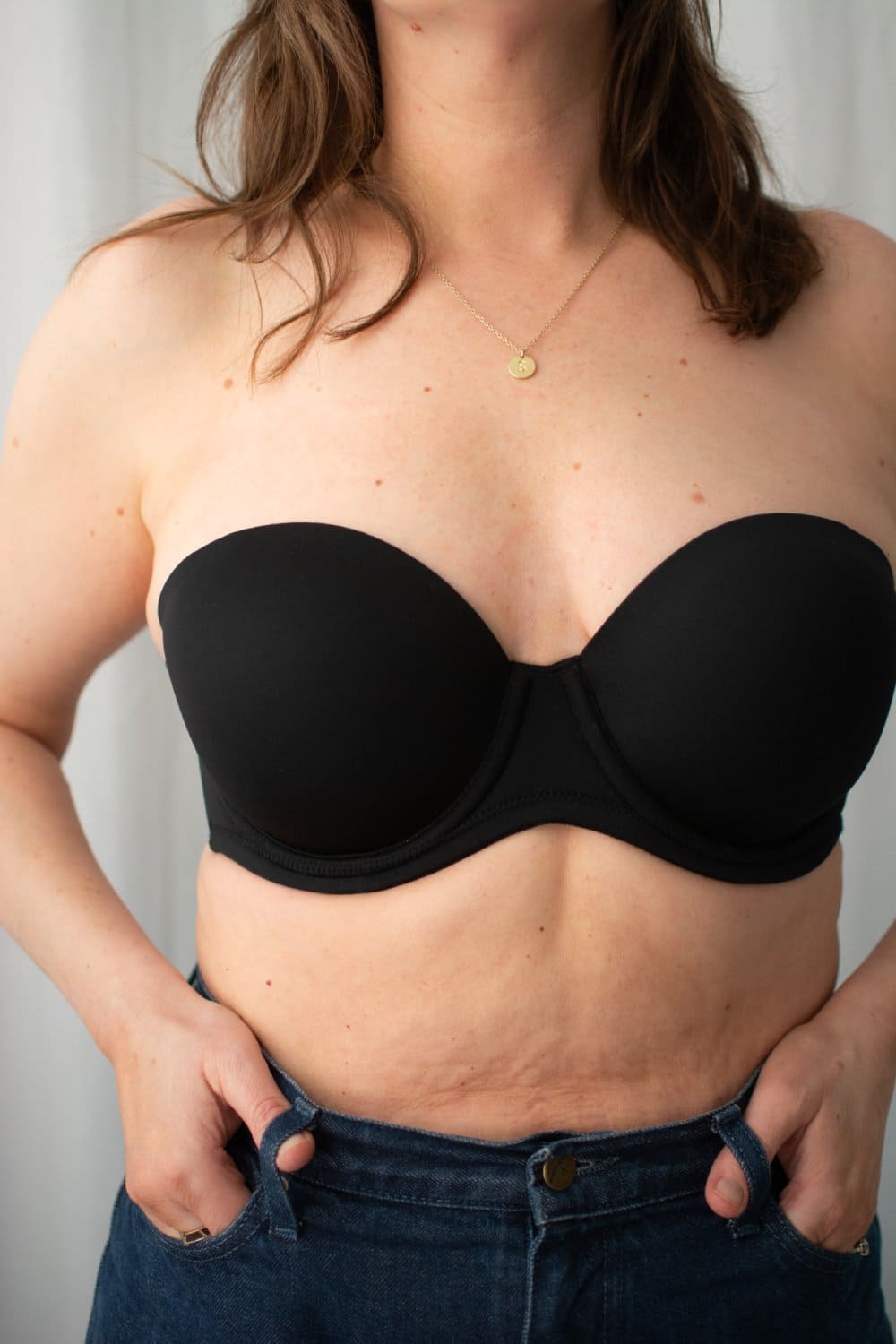 Wacoal red carpet strapless bra in black, front close-up on a model.