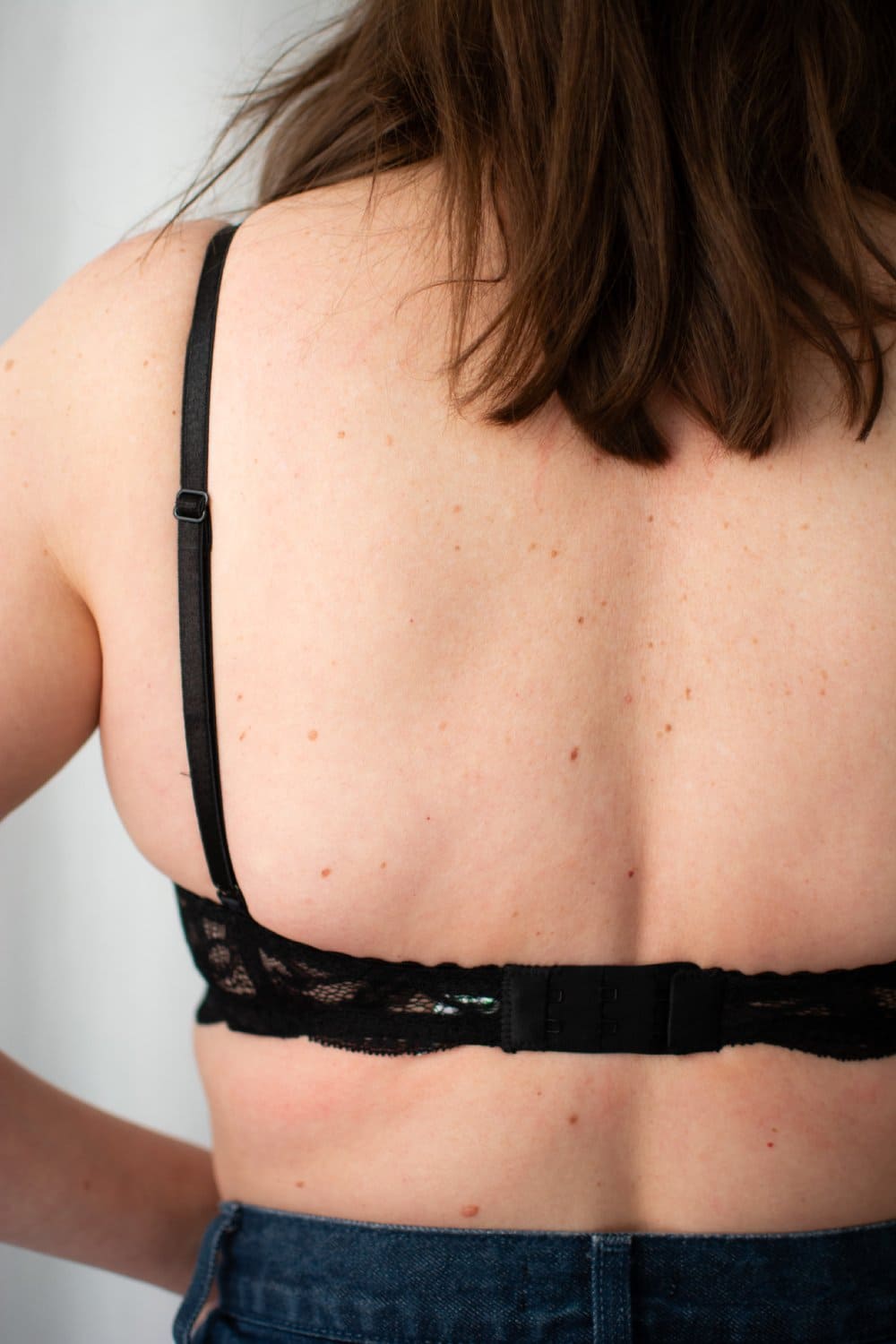 Clo intimo fortuna demi underwire bra in black, back view on a model, close-up.