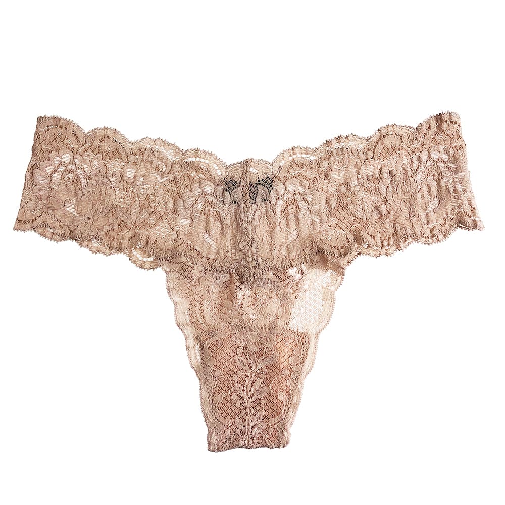 Beige thong against a white background