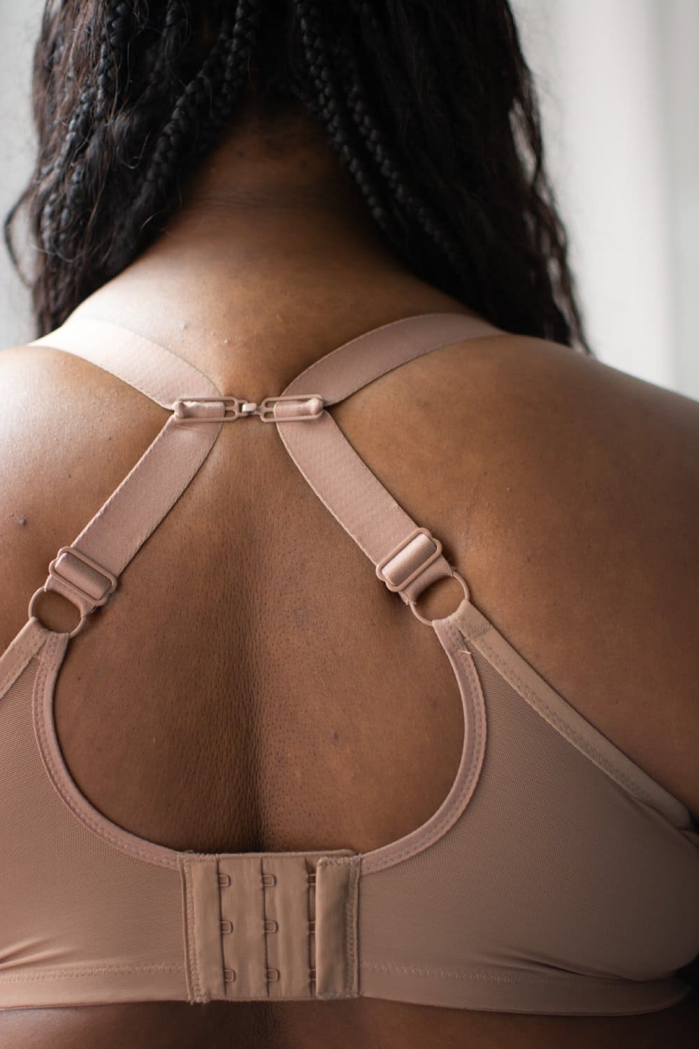 Elomi matilda plunge bra in praline, back view on a model, close-up.