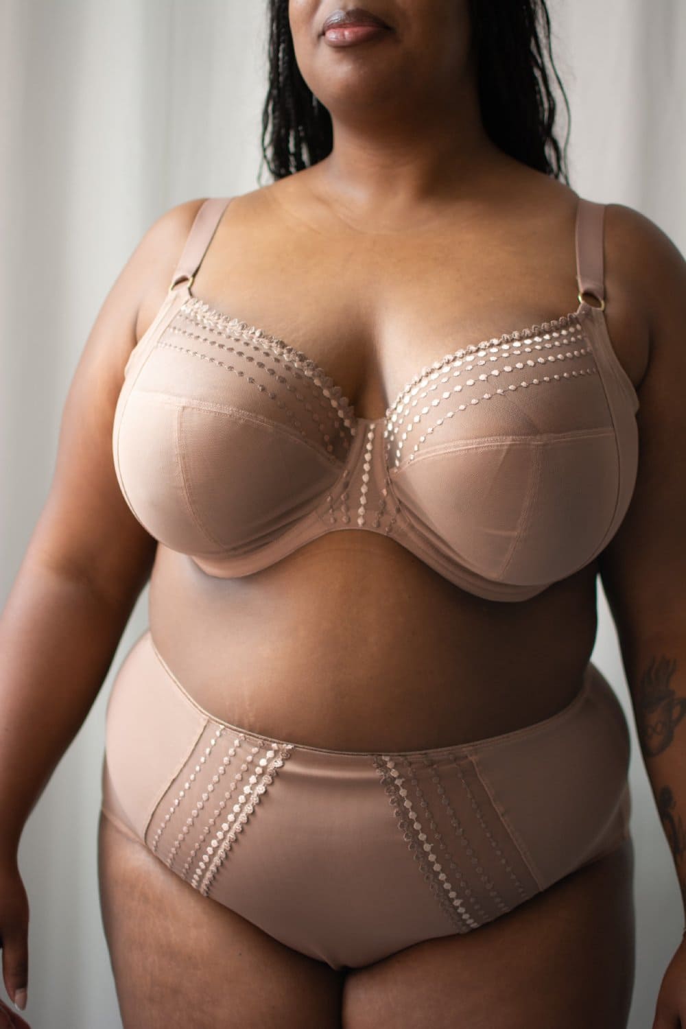 Elomi matilda plunge bra in praline, front view on a model.