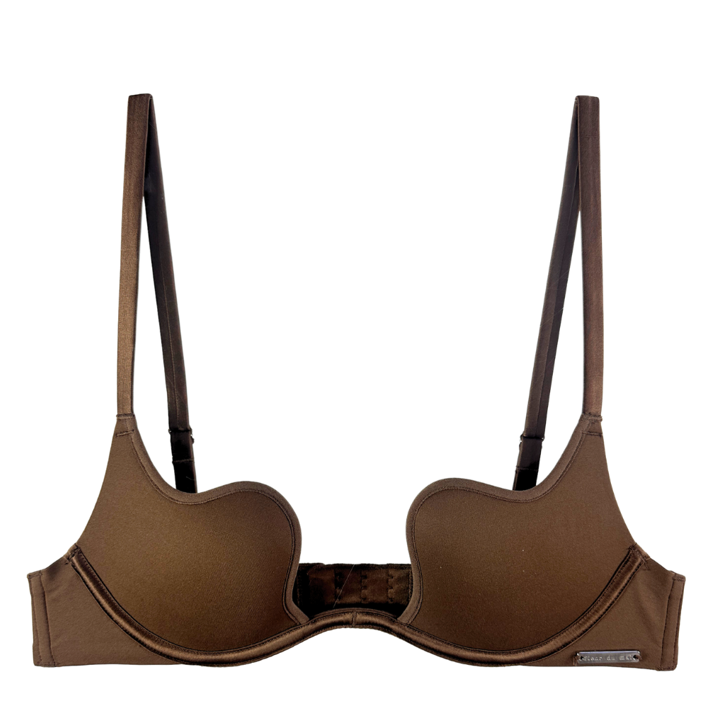 A brown seamless bra with a unique molded cup design and thin adjustable shoulder straps, shown against a plain white background.