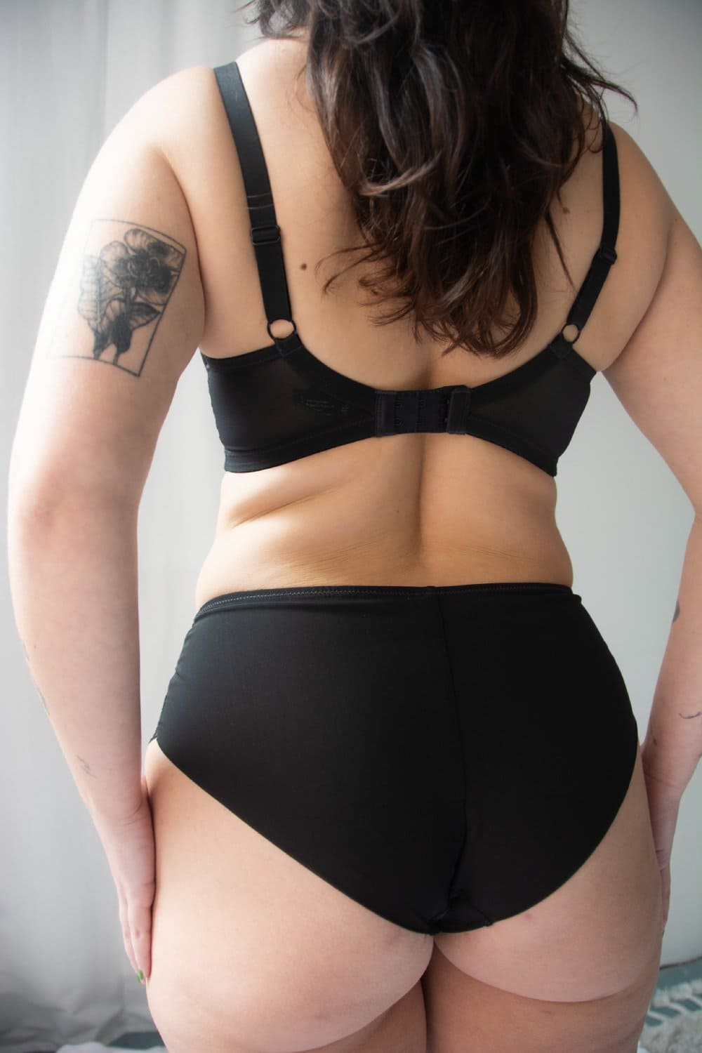 Panache ana full coverage plunge bra in black, back view on a model, close-up.