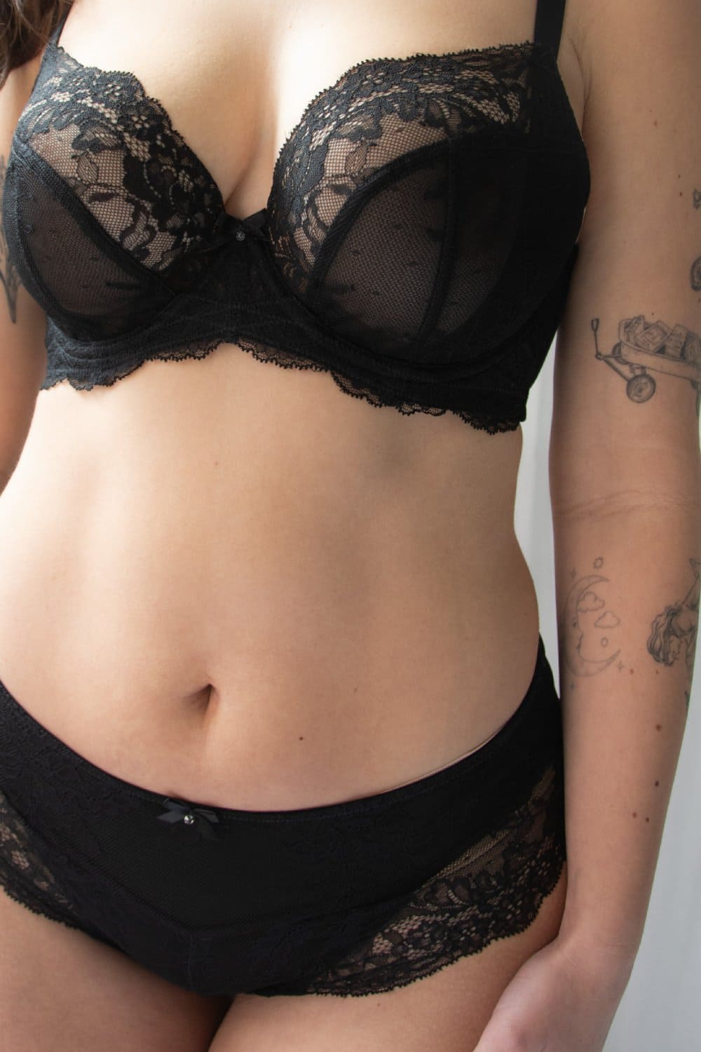 Panache ana full coverage plunge bra in black, front view on a model, close-up.