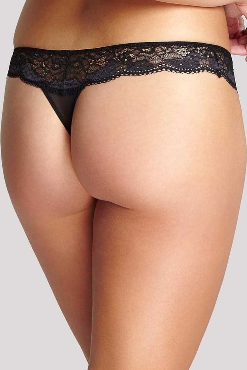 Panache clara thong in black charcoal, back view on a model, close-up.