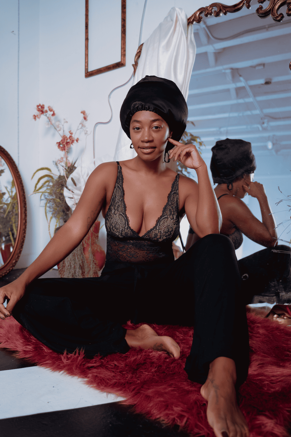 Samantha chang all lace bodysuit in black, front view on a model.
