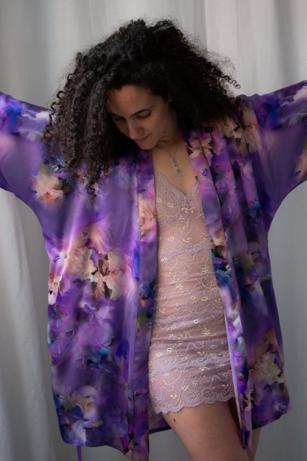 Samantha chang classic silk short kimono in snow flowers, front view on a model, open and spread, full visibility.