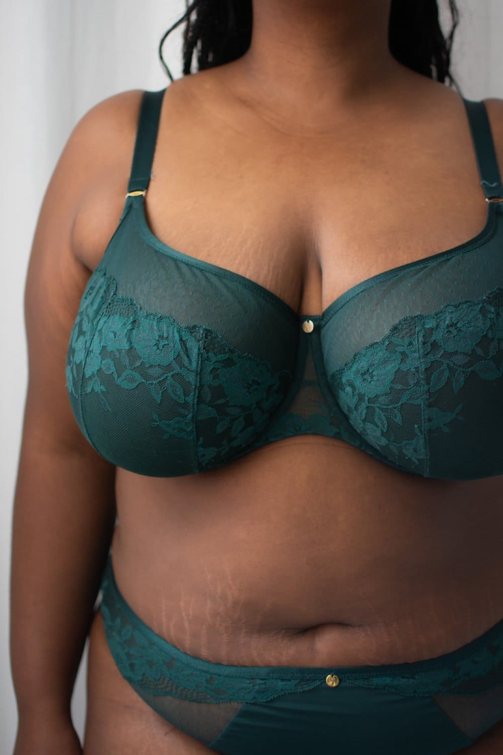 Sculptresse josephine full cup bra in forest green, front view on a model, close-up.