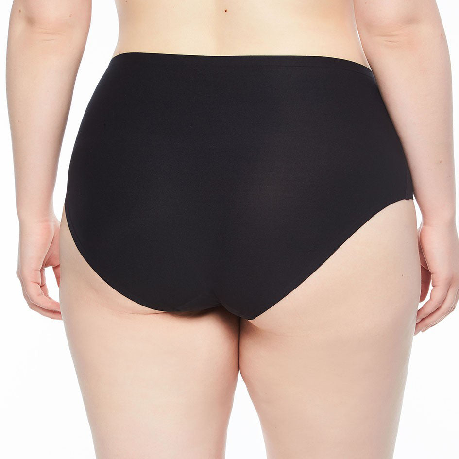 person wearing black underwear against a white background